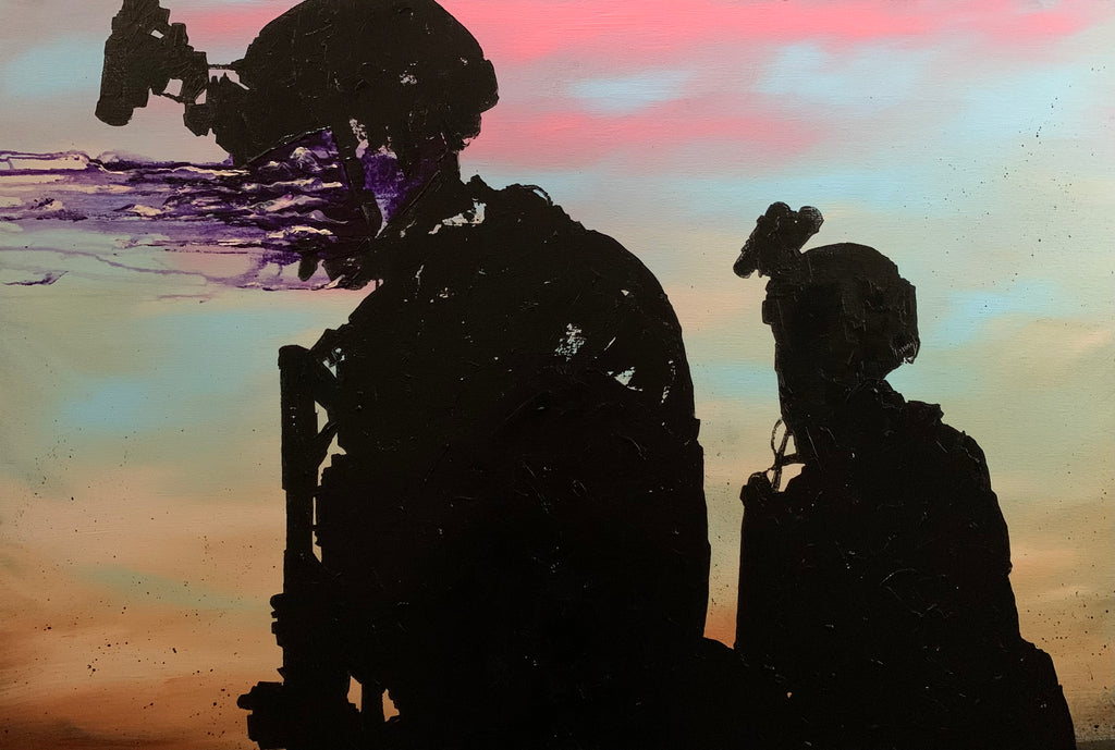 Military Operators silhouetted against the sunrise